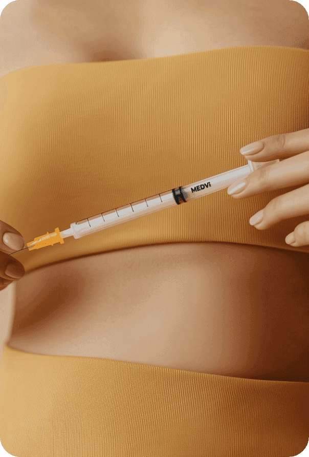 Woman using a GLP-1 injection pen